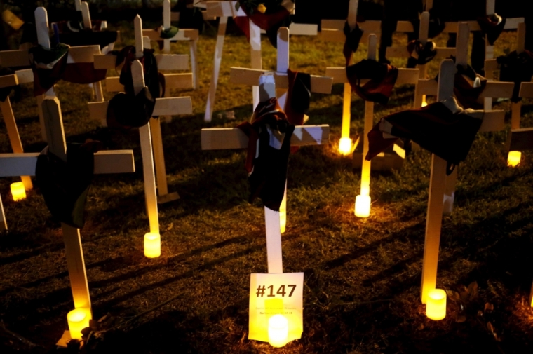 Wooden crosses are placed on the ground, symbolizing the people killed during an attack by gunmen at the Garissa University College, at the 'Freedom Corner' in Kenya's capital Nairobi April 7, 2015. Kenyan university students marched in the capital on Tuesday to demand more security from the government after gunmen killed nearly 150 people at a campus in the eastern town of Garissa last week. A citizens group planned to hold a vigil in Nairobi's main park later in the evening, tapping growing public frustration over security in the wake of the attack claimed by al-Shabaab radical Islamists based in neighboring Somalia.