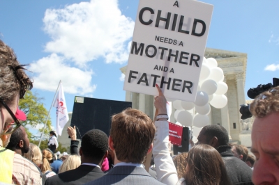 Traditional marriage and LGBT demonstrators gather around the steps of the Supreme Court building in Washington D.C. on April 28, 2015 for the oral arguments for Obergefell v. Hodges.