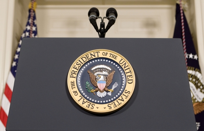 The Presidential Seal is seen on a podium at the White House in Washington, December 14, 2009.