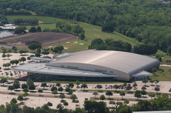 An aerial view shows the Curtis Culwell Center and the area around a car that was used the previous night by two gunmen, who were killed by police, as it is investigated by local police and the FBI in Garland, Texas, May 4, 2015. Texas police shot dead two gunmen who opened fire on Sunday outside an exhibit of caricatures of Muhammad that was organized by a group described as anti-Islamic and billed as a free-speech event.