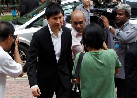 City Harvest Church founder Kong Hee arrives for his trial at the Subordinate Courts in Singapore, May 15, 2013. Prosecutors for the trial said they had evidence of a 'deliberately planned' scheme by church leaders to channel part of the church's building fund to fund the music career of Kong's wife, singer Sun Ho, according to local media.