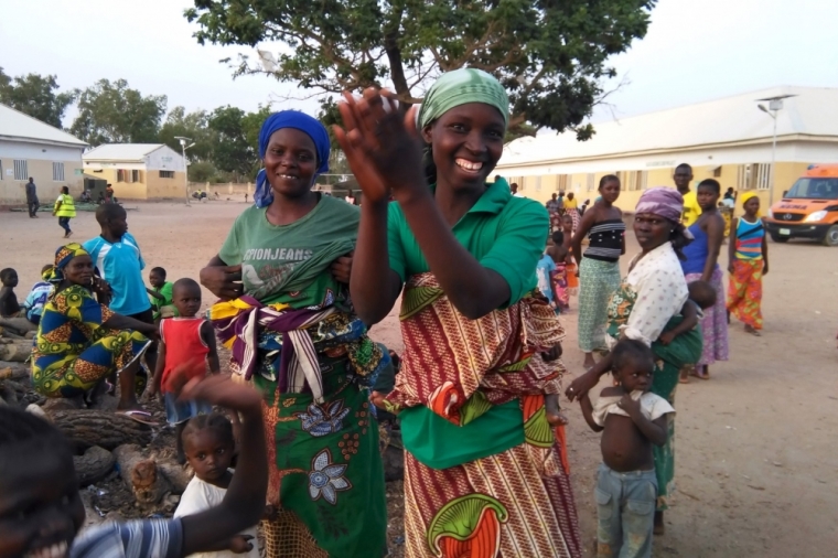 Women displaced by Boko Haram violence residing at the IDP camp yola, welcome other women and children rescued from Boko Haram in Sambisa forest by Nigeria Military as they arrive at the Internally displaced people's camp in Yola, Adamawa State, Nigeria, May 2, 2015.