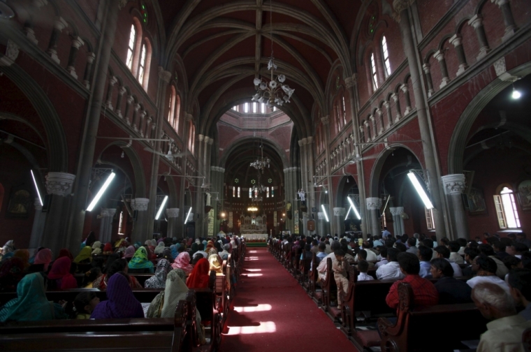 Pakistani Christians take part in Easter celebrations at the Sacred Heart of Jesus Church in Lahore, April 5, 2015.