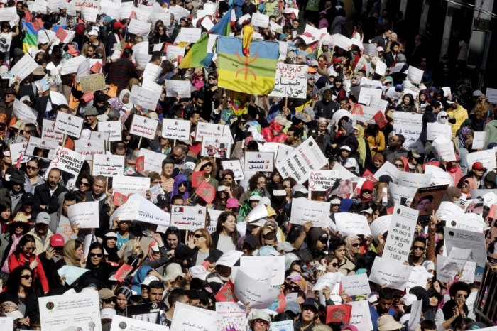 Women shout slogans during an International Women's Day rally in Rabat, Morocco, March 8, 2015.