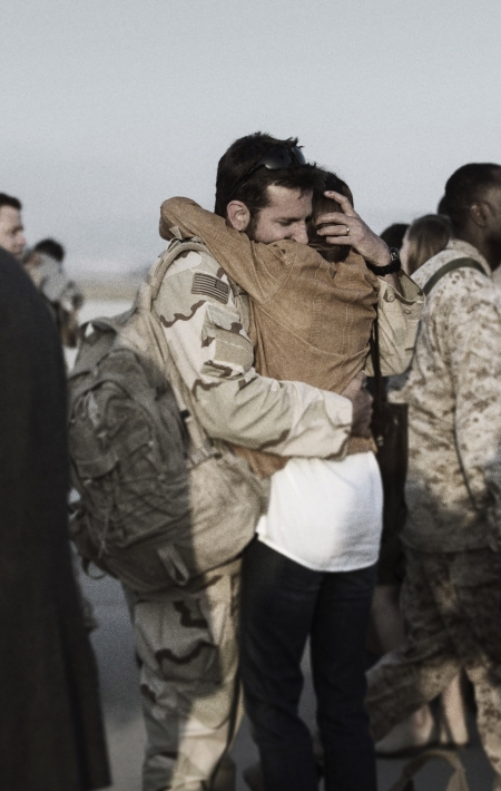 Bradley Cooper and Sienna Miller portray Chris and Taya Kyle in the 2014 film 'American Sniper.'