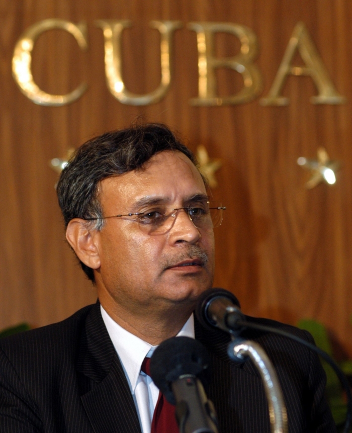 India's junior foreign minister Rao Inderjit Singh addresses the media during a media conference in Havana, Cuba, September 6, 2005. Singh said Cuba has given India's state-owned Oil and Natural Gas Corp two blocks of its Gulf of Mexico waters to explore for oil. Singh also said ONGC is negotiating a 30 percent share in blocks contracted by Spain's Repsol YPF oil major.