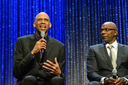 NBA legend Kareem Abdul-Jabbar speaks as Clyde Drexler looks during the 2014 NBA All-Game Legends Brunch at Ernest N. Morial Convention Center in New Orleans, Louisiana, February 16, 2014.