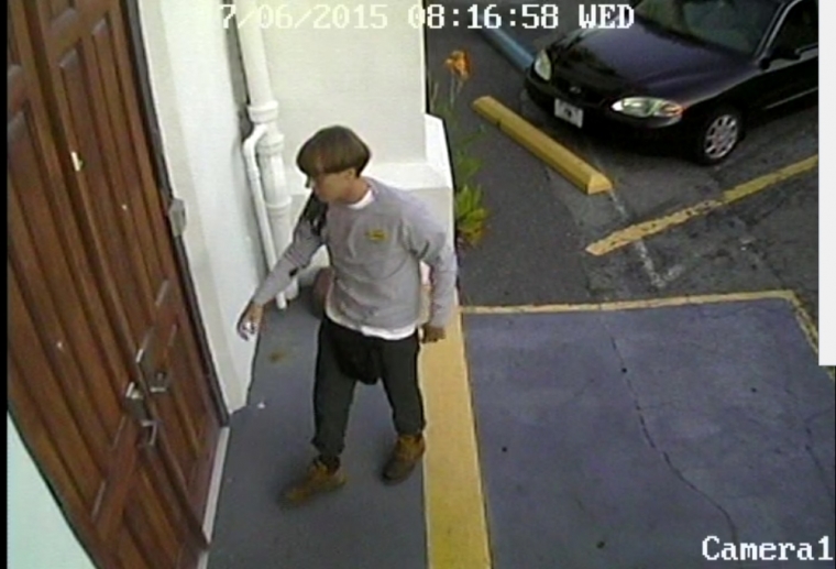 A suspect which police are searching for in connection with the shooting of several people at a church in Charleston, South Carolina, is seen in a still image from CCTV footage released by the Charleston Police Department June 18, 2015. A white gunman was still at large after killing nine people during a prayer service at an historic African-American church in Charleston, South Carolina, the city's police chief said on Thursday, describing the attack as a hate crime.