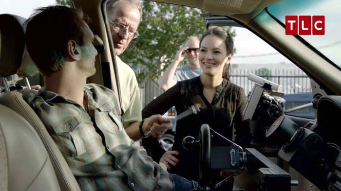 Christian motivational speaker Nick Vujicic sits behind the wheel of a customized car in the TLC special 'Man Born Without Limbs.'