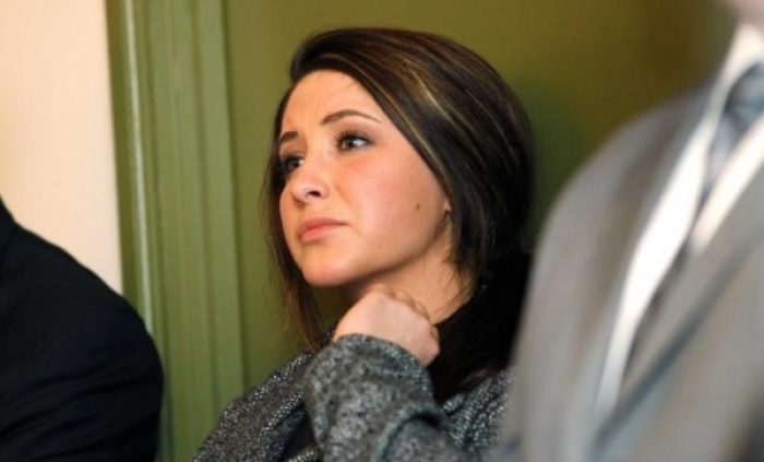 Bristol Palin watches while her mother former Alaska governor Sarah Palin delivers her keynote speech at the Reagan 100 opening banquet at the Reagan Ranch Center in Santa Barbara, California February 4, 2011.