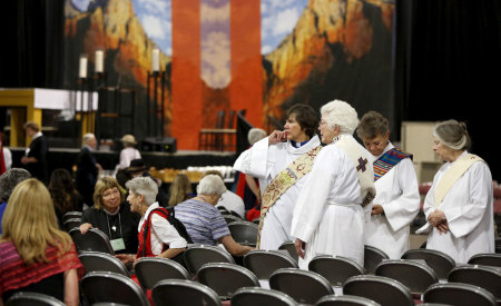 A group of deacons arrive for a church service during the General Convention of the Episcopal Church in Salt Lake City, Utah June 28, 2015. The General Convention of the Episcopal Church is held every three years in different cities around the country.