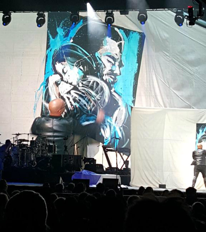 Performance painter David Garibaldi paints live before an audience gathered Tuesday, July 7, 2015, at Radio City Music Hall in New York City for The Luis Palau Association NYCityFest.