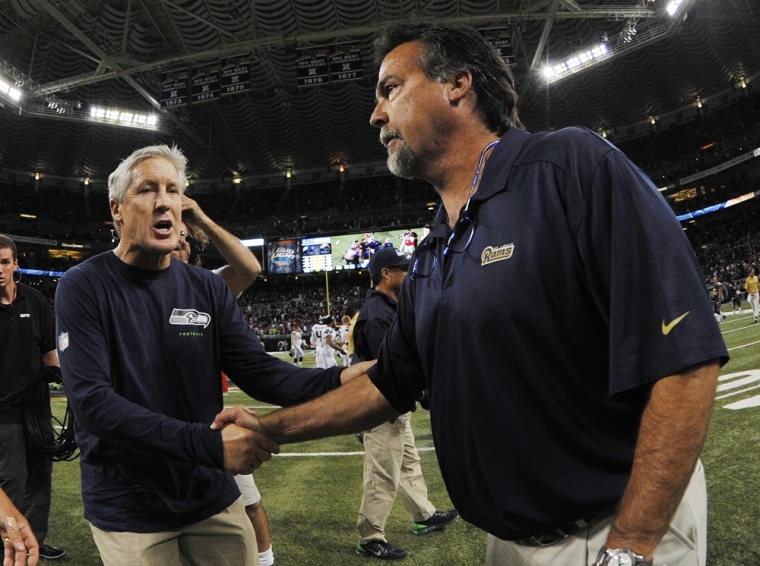 Seattle Seahawks head coach Pete Carroll and St. Louis Rams head coach Jeff Fisher shake hands after the game between the St. Louis Rams and the Seattle Seahawks at Edward Jones Dome. The Seahawks defeat the Rams 14-9, St. Louis, Missouri, October 28, 2013.