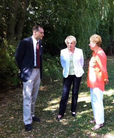 Pastor Eric Eichinger, author of the screenplay for 'Absolute Surrender,' speaks with Patricia Russell (center) and Heather Ingham, daughters of the 1924 Olympian Eric Liddell.