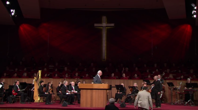 An unknown man clad in black confronted Grace Community Church pastor John MacArthur during service on Sunday, Aug. 16, 2015, in Sun Valley, California.