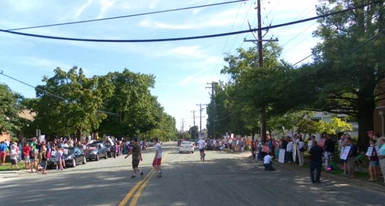 Pro-life protesters line both sides of North Hamilton Street in Richmond, Virginia, demonstrating against a Planned Parenthood clinic on Saturday, August 22, 2015.