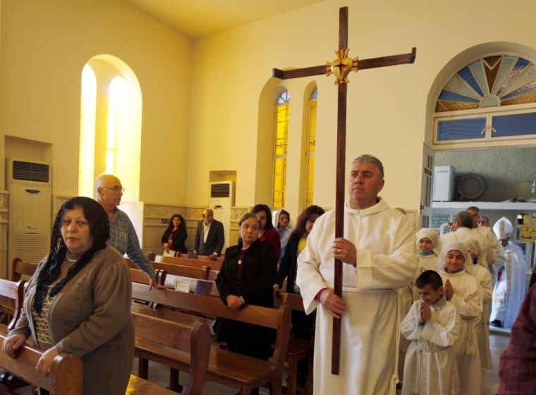 Iraqi Christians attend mass at Mar George Chaldean Church in Baghdad, March 1, 2015. Iraqi Christians say they have no intention of leaving the country despite the recent abduction of over 100 Assyrian Christians by the Islamic State.