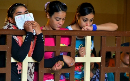 Christians attend Sunday service in the Virgin Mary Church at Samalout Diocese in Al-Our village, in Minya governorate, south of Cairo, May 3, 2015.