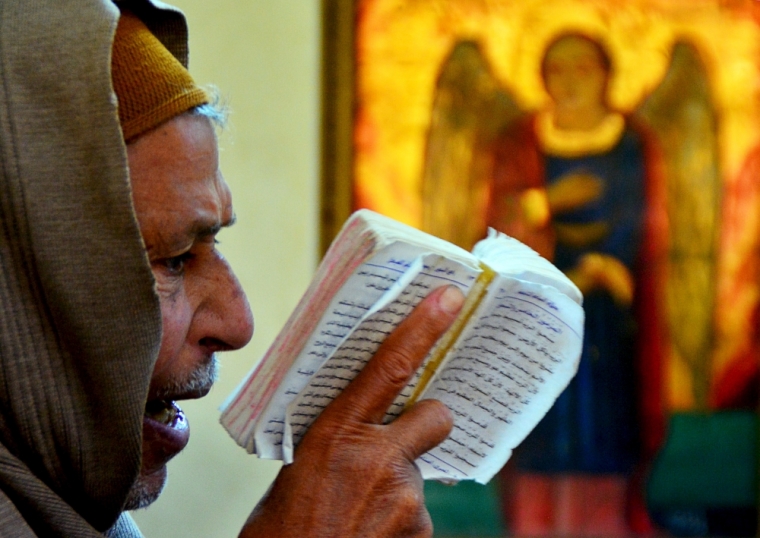 The father of Saber attends Sunday service in the Virgin Mary Church at Samalout Diocese in Al-Our village, in Minya governorate, south of Cairo, May 3, 2015. Saber was amongst a group of 21 Copts killed by Islamic State militants in Libya this year. Copts have long complained of discrimination under successive Egyptian leaders and Sisi's actions suggested he would deliver on promises of being an inclusive president who could unite the country after years of political turmoil. However, striking out at extremists abroad might prove easier than reining in radicals at home. Orthodox Copts, the Middle East's biggest Christian community, are a test of Sisi's commitment to tolerance, a theme he often stresses in calling for an ideological assault on Islamist militants threatening Egypt's security.