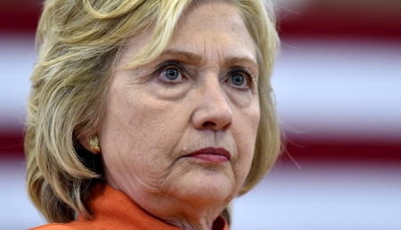 Democratic presidential candidate Hillary Clinton looks on as she speaks during a town hall meeting in Las Vegas, Nevada, August 18, 2015.