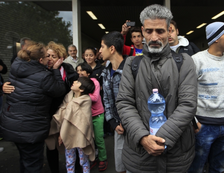 Migrants arrive at the main railway station in Dortmund, Germany September 6, 2015. Austria and Germany threw open their borders to thousands of exhausted migrants on Saturday, bussed to the Hungarian border by a government that was overwhelmed by the sheer numbers reaching Europe's frontiers.