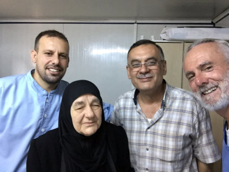 New York City pastor William Devin is seen with new friends in the Syrian border town of Reyhanli, Turkey. Devlin has been volunteering at a clinic aiding refugees fleeing war-torn Syria. This photo was shared with The Christian Post on Sept. 6, 2015.