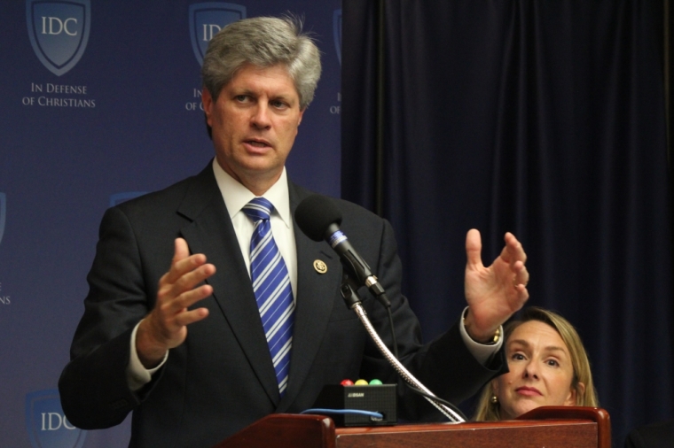 Congressman Jeff Fortenberry, R-Neb., announces that the introduction of a resolution in the House calling for the U.S. government to label the atrocities committed by ISIS as a genocide. Fortenberry made a surprise appearance at an In Defense of Christians panel discussion on the persecution of Middle Eastern Christians at the National Press Club in Washington, D.C. on Sept. 9, 2015.