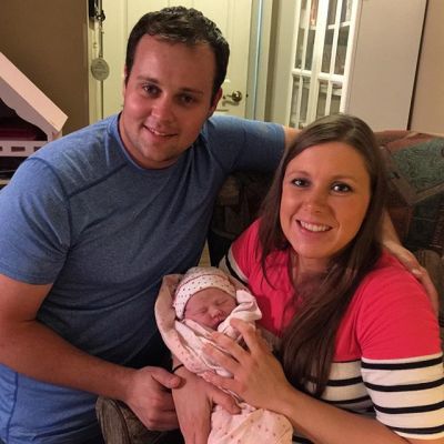 Josh and Anna Duggar with new baby.