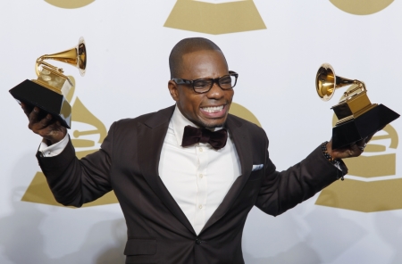 Gospel artist Kirk Franklin holds his awards for Best Gospel Album and Best Gospel Song 'Hello Fear' at the 54th Annual Grammy Awards in Los Angeles, California, February 12, 2012.