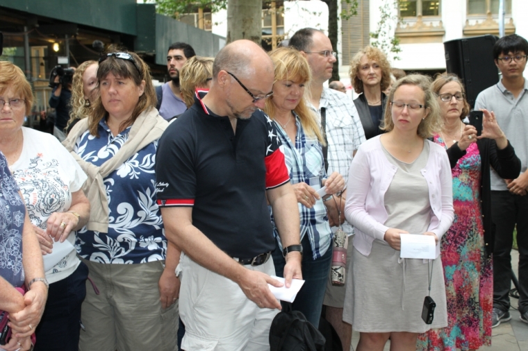 A crowd gathers in St. Paul's Chapel in New York City on September 11, 2015, to remember those who died during the terrorist attack of September 11, 2001.