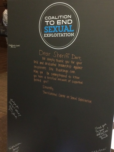 Poster seen at the entrance to the second annual Coalition to End Sexual Exploitation Summit in Orlando, Florida, September 11, 2015.