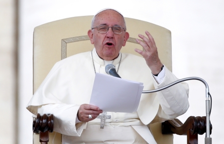 Pope Francis speaks as he leads the weekly audience in Saint Peter's Square at the Vatican September 16, 2015.