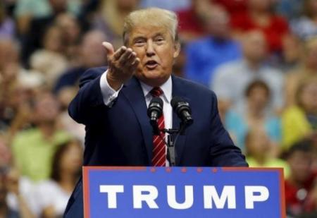 Republican presidential candidate Donald Trump speaks at a rally in Dallas, Texas September 14, 2015.