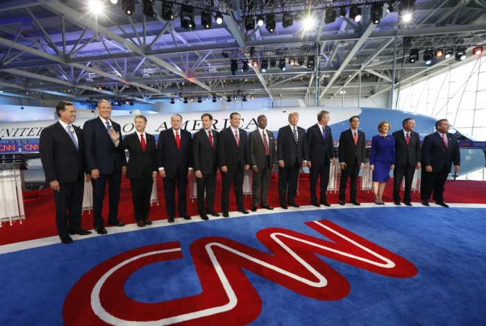 Republican U.S. presidential candidates (L-R) including former U.S. Senator Rick Santorum, former New York Governor George Pataki, U.S. Senator Rand Paul, former Arkansas Governor Mike Huckabee, U.S. Senator Marco Rubio, U.S. Senator Ted Cruz, Dr. Ben Carson, businessman Donald Trump, former Florida Governor Jeb Bush, Wisconsin Governor Scott Walker, former CEO Carly Fiorina, Ohio Governor John Kasich and New Jersey Governor Chris Christie pose before the start of the second official Republican presidential candidates debate of the 2016 U.S. presidential campaign at the Ronald Reagan Presidential Library in Simi Valley, California, September 16, 2015.