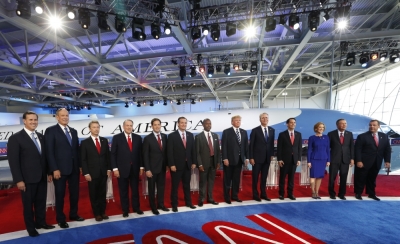 Republican U.S. presidential candidates including (L-R) former U.S. Senator Rick Santorum, former New York Governor George Pataki, U.S. Senator Rand Paul, former Arkansas Governor Mike Huckabee, U.S. Senator Marco Rubio, U.S. Senator Ted Cruz, Dr. Ben Carson, businessman Donald Trump, former Florida Governor Jeb Bush, Wisconsin Governor Scott Walker, former CEO Carly Fiorina, Ohio Governor John Kasich and New Jersey Governor Chris Christie pose before the start of the second official Republican presidential candidates debate of the 2016 U.S. presidential campaign at the Ronald Reagan Presidential Library in Simi Valley, California, September 16, 2015.