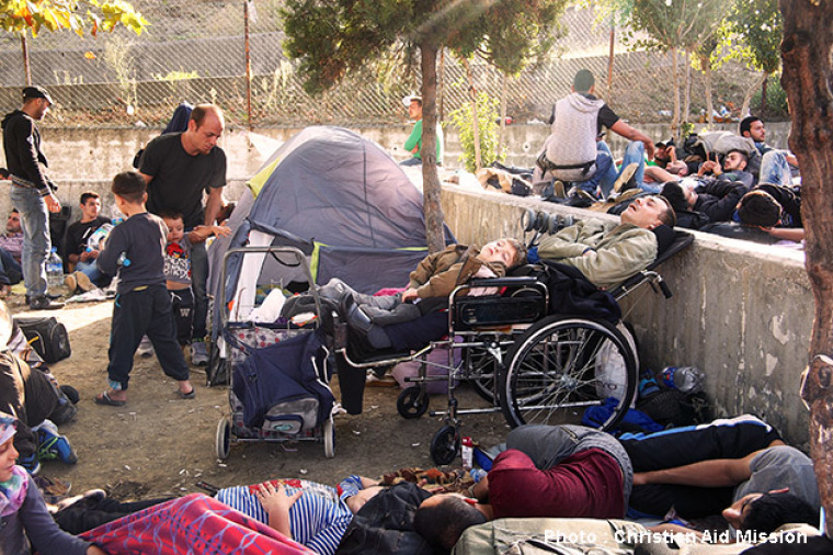 Refugees from Syria at a bus station in Istanbul, Turkey, including a wheelchair-bound man unable to get medical treatment, in this undated photo.