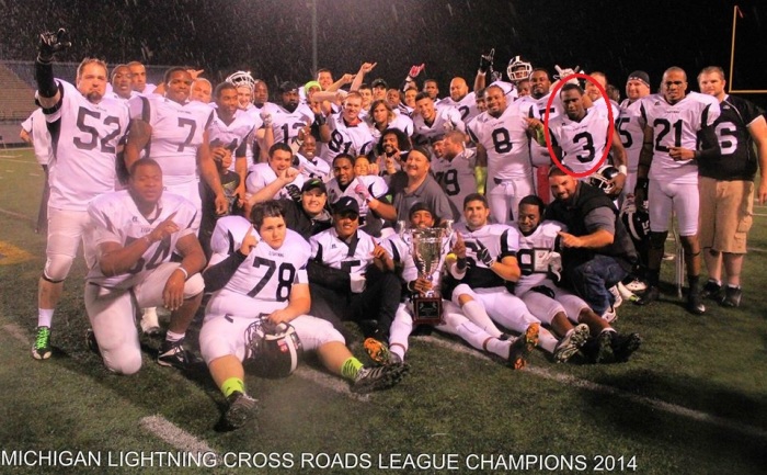 The late Deante Smith, 25, (circled) with his semi-pro football team Michigan Lightning.