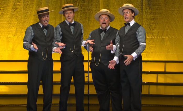 Main Street barbershop quartet performs a humorous musical medley.