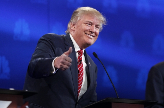 Republican U.S. presidential candidate businessman Donald Trump gives a thumbs up near the end of the 2016 U.S. Republican presidential candidates debate held by CNBC in Boulder, Colorado, October 28, 2015.