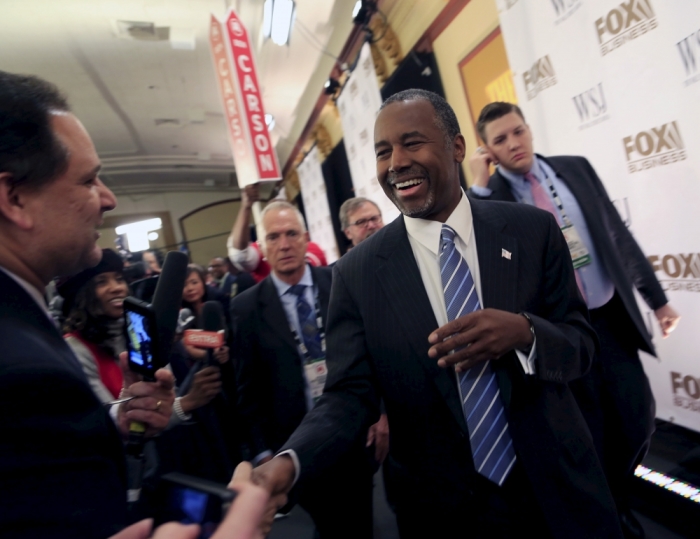 Republican presidential candidate Dr. Ben Carson takes questions from the media in the spin room after the debate held by Fox Business Network for the top 2016 U.S. Republican candidates in Milwaukee, Wisconsin November 10, 2015.