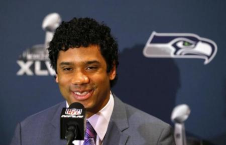 Seahawks' quarterback Russell Wilson at a press conference to kickstart Super Bowl XLVIII.