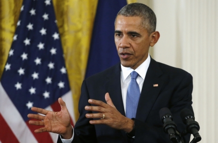 U.S. President Barack Obama addresses a joint news conference with French President Francois Hollande in the East Room of the White House in Washington November 24, 2015.