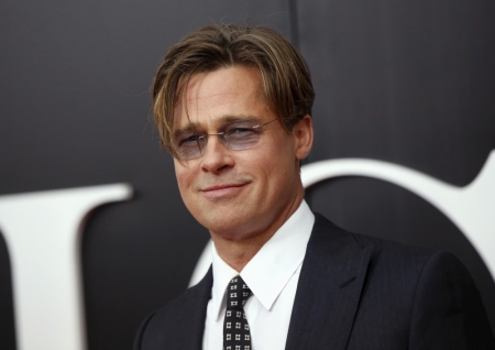 Cast member Brad Pitt poses on the red carpet at the premiere of 'The Big Short' in New York, November 23, 2015.