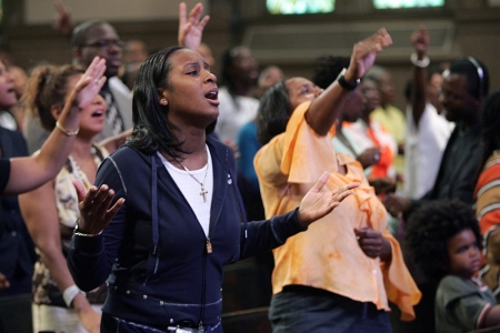 Churchgoers sing praises during the third service of the morning at Christ Church in Montclair, New Jersey, on September 4, 2005. The church, which holds five services every Sunday to accommodate the interest of their more then 5000 members, is planning to build a larger facility in nearby Rockaway Township despite resistance from residents and the local government.