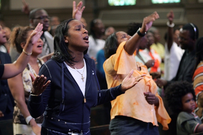 Churchgoers sing praises during the third service of the morning at Christ Church in Montclair, New Jersey, on September 4, 2005. The church, which holds five services every Sunday to accommodate the interest of their more then 5000 members, is planning to build a larger facility in nearby Rockaway Township despite resistance from residents and the local government.