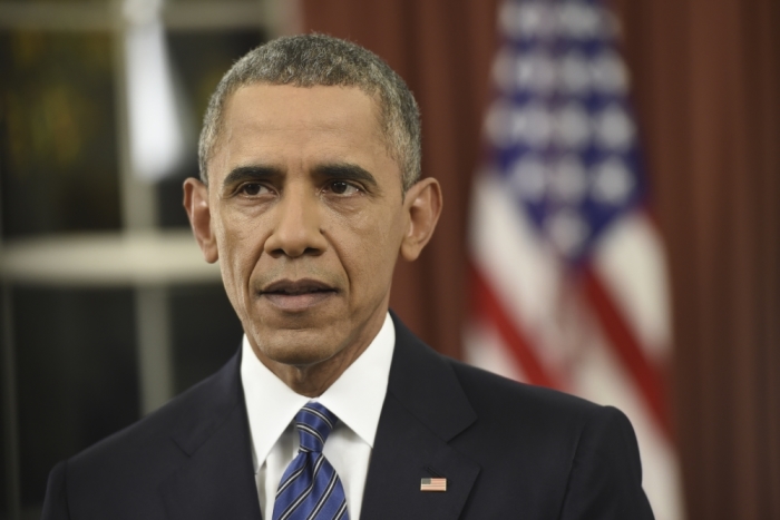 U.S. President Barack Obama speaks about counter-terrorism and the United States fight against Islamic State during an address to the nation from the Oval Office of the White House in Washington, December 6, 2015.