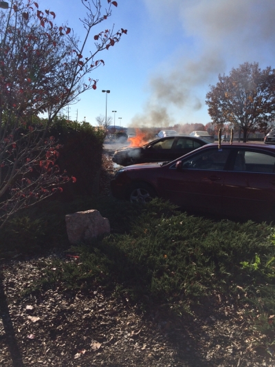 Morgan Carter's car engulfed in flames at the Chick-fil-A in Madison, Tennessee on Dec. 4, 2015.