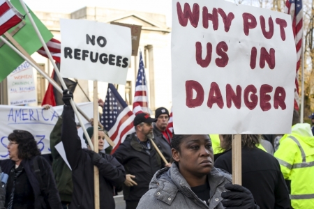 People gather to protest against the United States' acceptance of Syrian refugees at the Washington State capitol in Olympia, Washington, November 20, 2015.