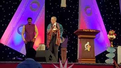 Theologian Michael Brown (center) speaking at Calvary Temple with Pastor Satish Kumar (left), Hyderabad, India.