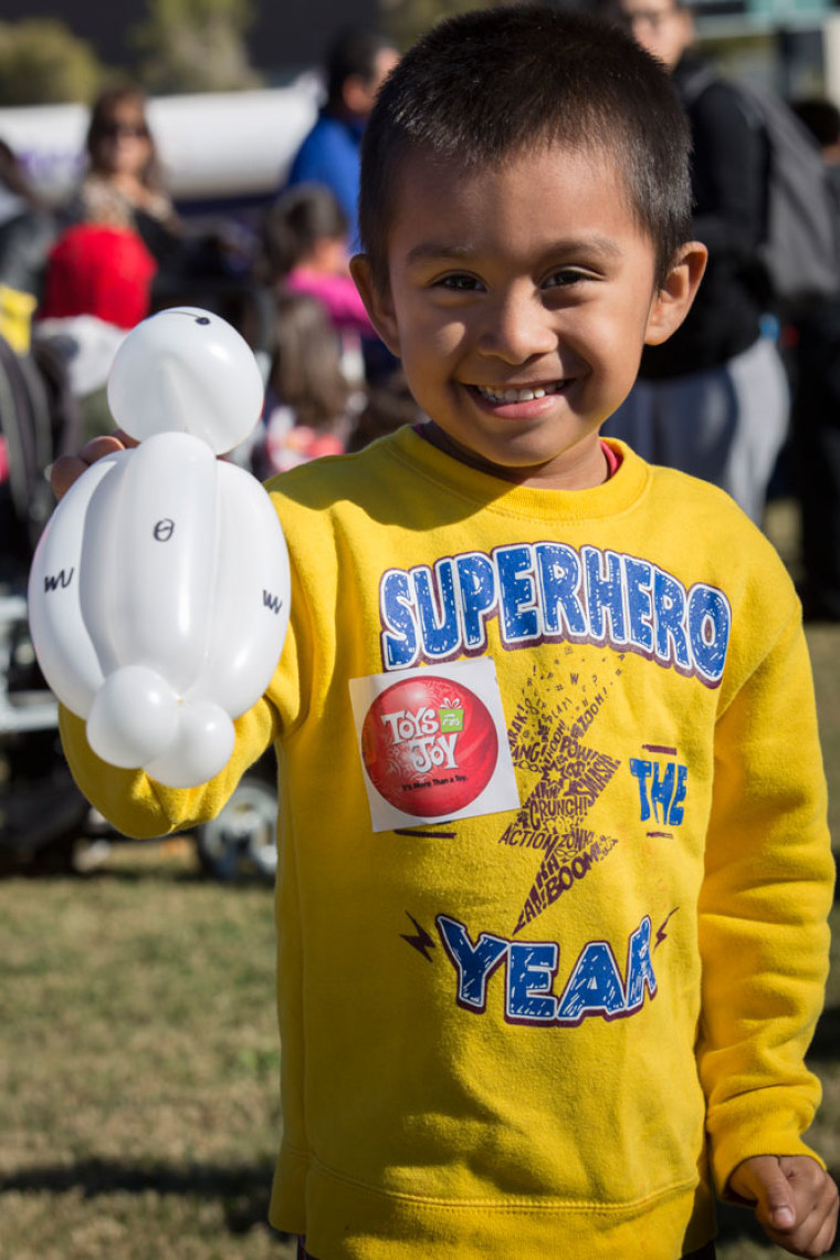 The 19th annual Toys for Joy event, organized by The Rock Church, gave away nearly 23,000 toys to underserved children in the San Diego area on Saturday, Dec. 12, 2015.